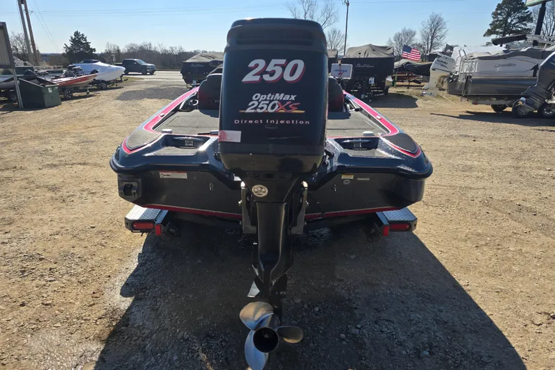 Slide: The Image of 2009 Triton 20X3 Pro DC boat with OptiMax 250XS engine in a boatyard. - 6