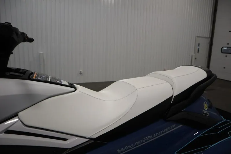 Slide: The Image of 2026 Yamaha WaveRunner FX HO with sleek white seat design in a showroom. - 17