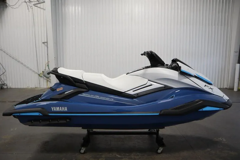 Slide: The Image of 2026 Yamaha WaveRunner FX HO in blue and white, displayed indoors. - 3