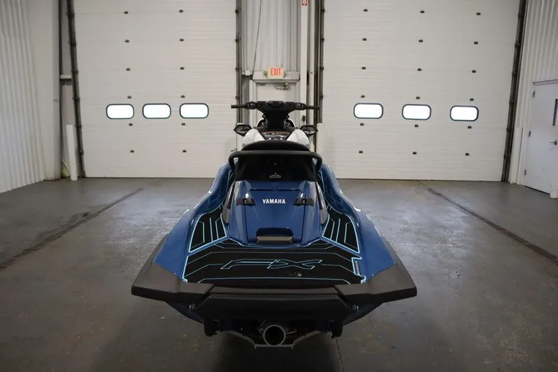 Slide: The Image of 2026 Yamaha WaveRunner FX HO in a garage, rear view. - 6