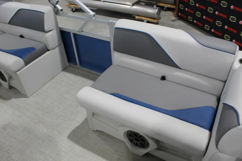 Slide: The Image of 2025 Avalon 1575 23 Venture CR boat interior with gray and blue seating. - 5