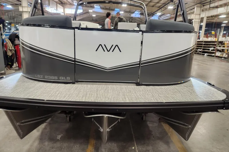The Image of 2026 Tahoe Pontoon LTZ Quad Lounger Shift 23 in a warehouse setting. - 0