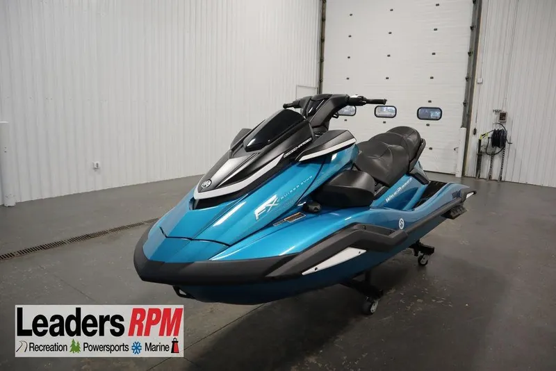 Slide: The Image of 2025 Yamaha WaveRunner FX Cruiser SVHO in a showroom, featuring sleek blue design. - 29