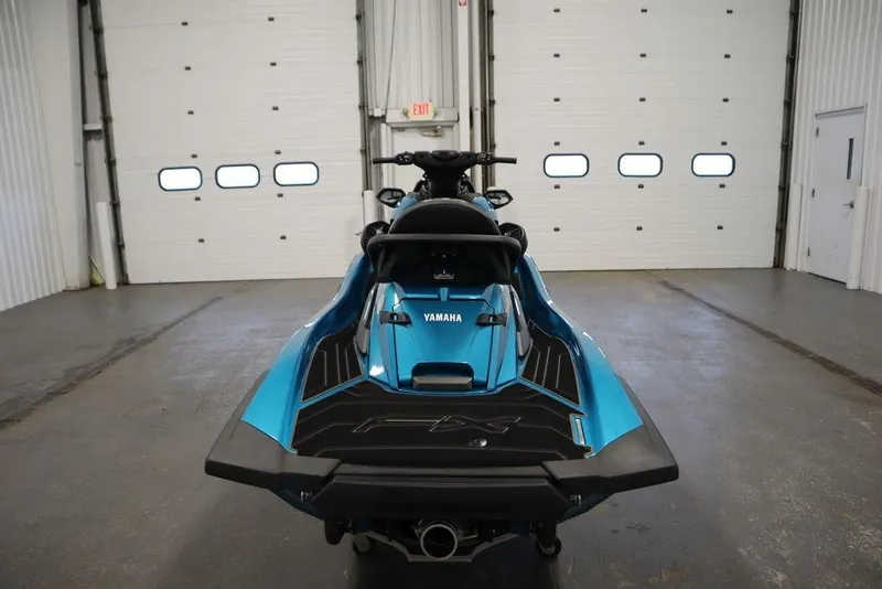 Slide: The Image of 2025 Yamaha WaveRunner FX Cruiser SVHO in a garage, rear view. - 6