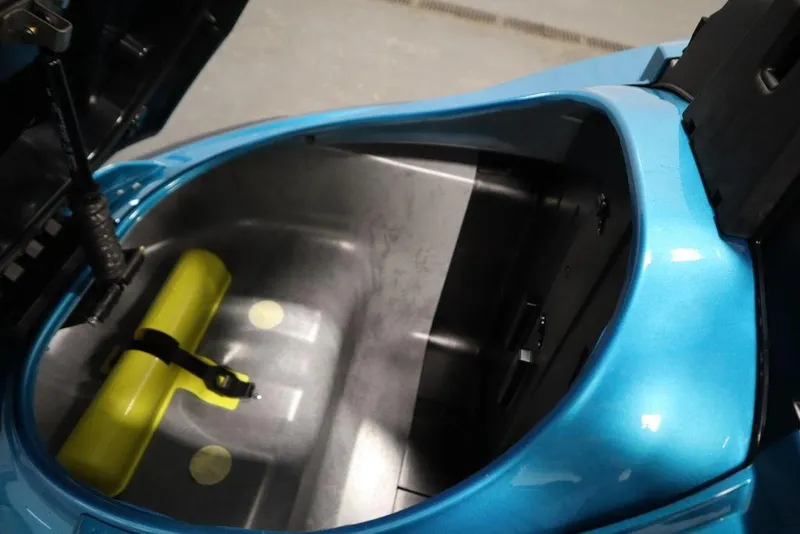 Slide: The Image of 2025 Yamaha WaveRunner FX Cruiser SVHO storage compartment with yellow safety equipment. - 8