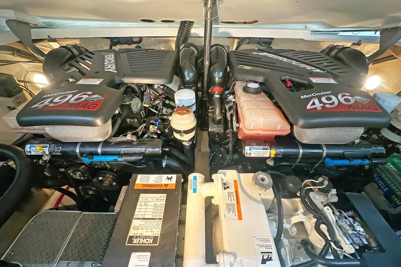 Slide: The Image of Twin MerCruiser 496 MAG engines in a 2005 Formula 330 Sun Sport boat. - 26