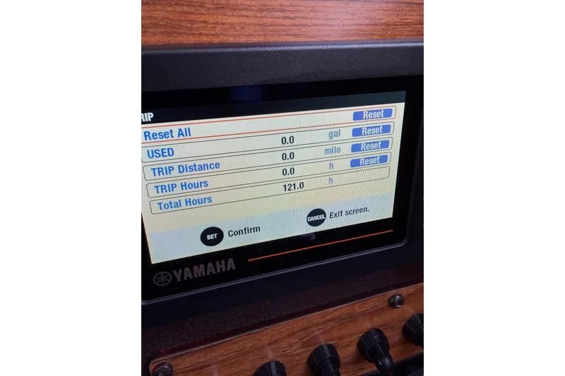 Slide: The Image of Yamaha display on 2019 Ranger Tugs R-23 showing trip and total hours. - 8