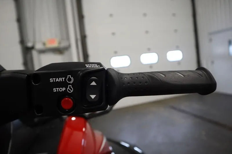 Slide: The Image of Handlebar controls of 2026 Yamaha WaveRunner VX Deluxe in a garage setting. - 14