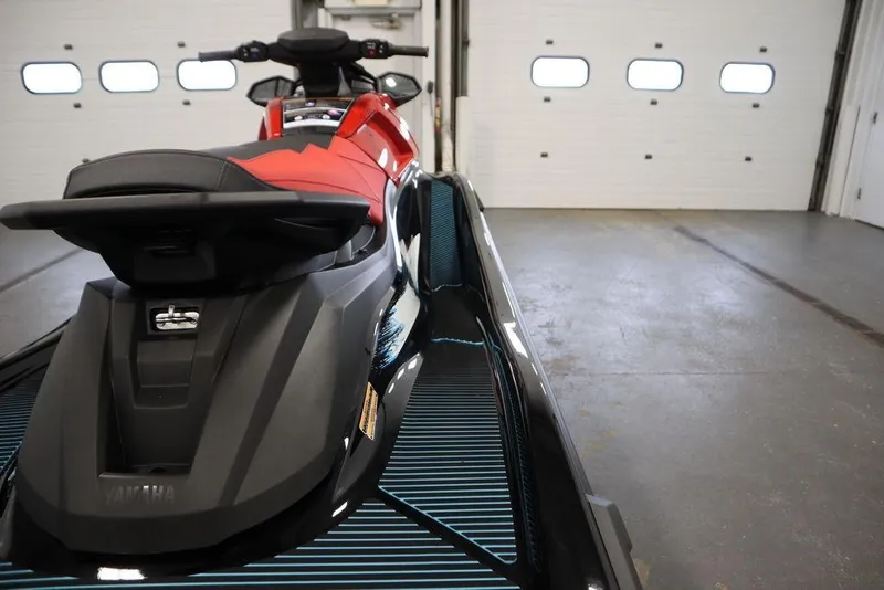 Slide: The Image of 2026 Yamaha WaveRunner VX Deluxe in a garage, showcasing sleek design and modern features. - 16