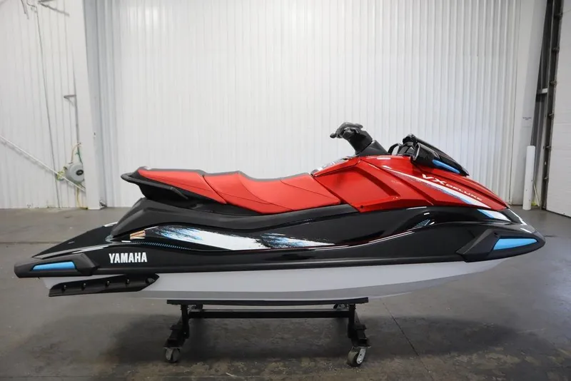 Slide: The Image of 2026 Yamaha WaveRunner VX Deluxe in red and black, displayed indoors. - 4