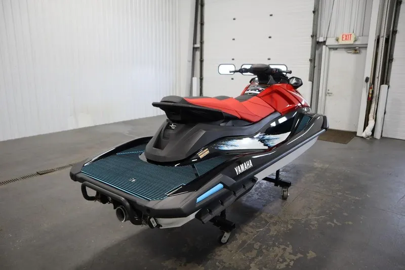 Slide: The Image of 2026 Yamaha WaveRunner VX Deluxe in a garage, showcasing sleek design and vibrant colors. - 6