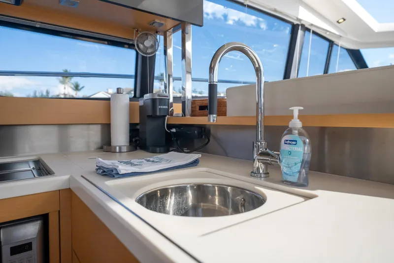 Slide: The Image of Modern kitchen sink area on a 2013 Prestige 500S yacht with faucet and soap dispenser. - 12