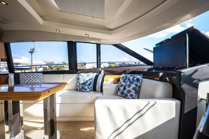 Slide: The Image of Luxurious interior of 2013 Prestige 500S yacht with elegant seating and decor. - 36