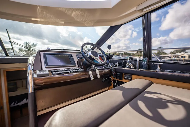 Slide: The Image of Interior view of 2013 Prestige 500S yacht cockpit with modern navigation equipment. - 43