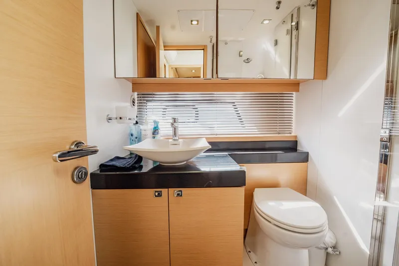 Slide: The Image of Luxurious bathroom in 2013 Prestige 500S yacht with modern fixtures and sleek design. - 55