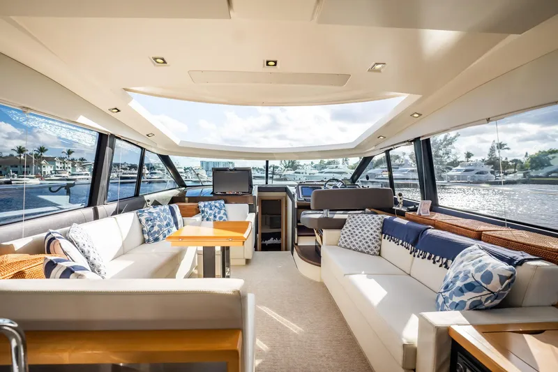 Slide: The Image of Luxurious interior of 2013 Prestige 500S yacht with elegant seating and panoramic windows. - 6