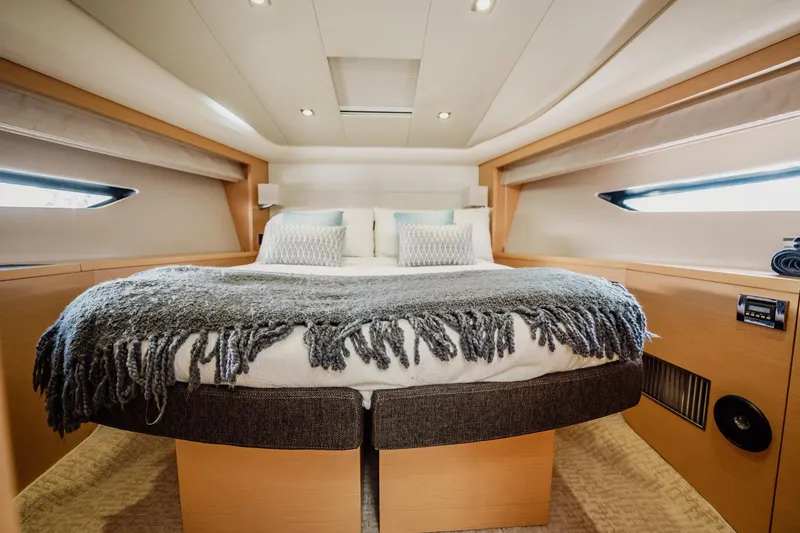 Slide: The Image of Luxurious bedroom interior of 2013 Prestige 500S yacht with cozy bedding. - 61