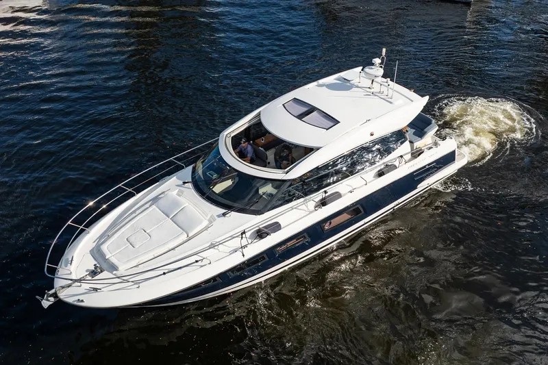Slide: The Image of 2013 Prestige 500S yacht cruising on water, aerial view. - 66
