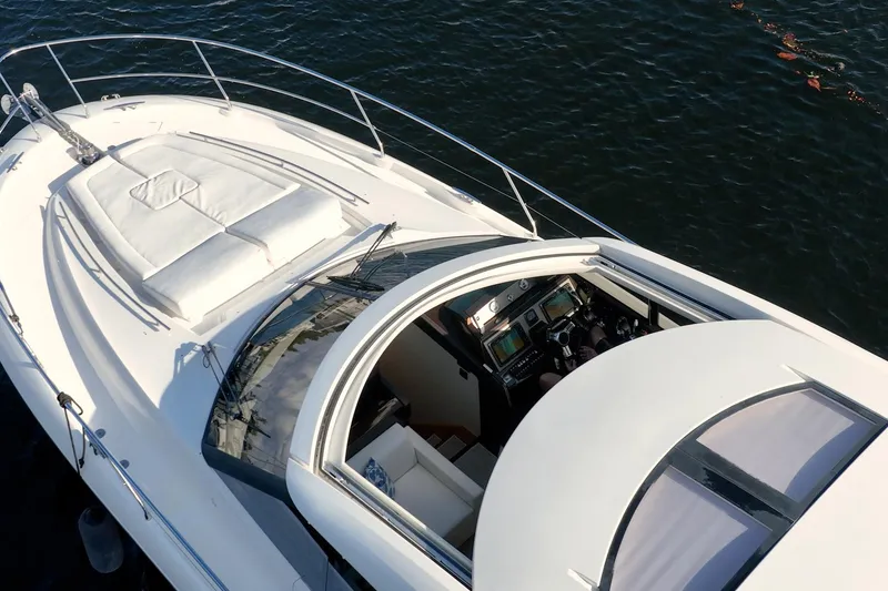 Slide: The Image of Aerial view of 2013 Prestige 500S yacht with sleek design and spacious deck. - 69