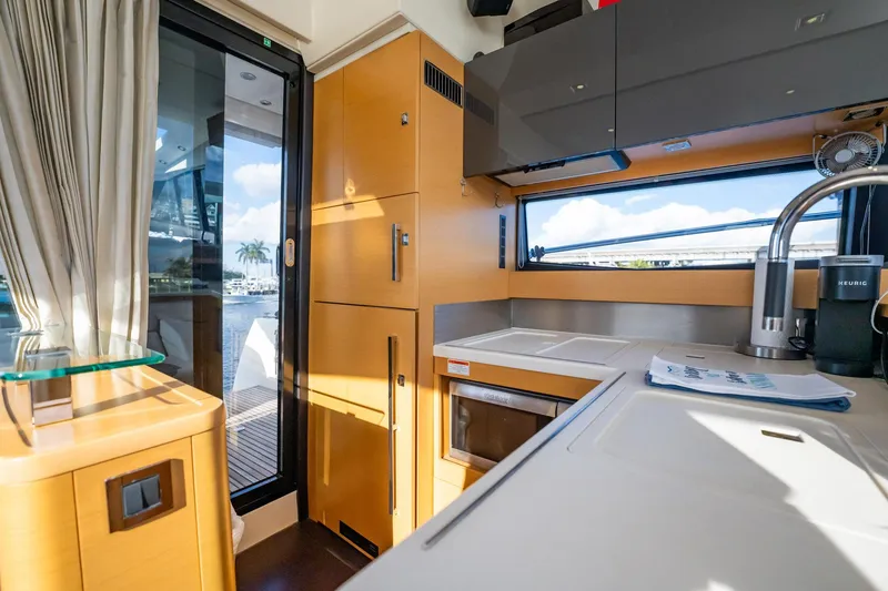 Slide: The Image of Modern kitchen interior of 2013 Prestige 500S yacht with sleek cabinetry and appliances. - 7