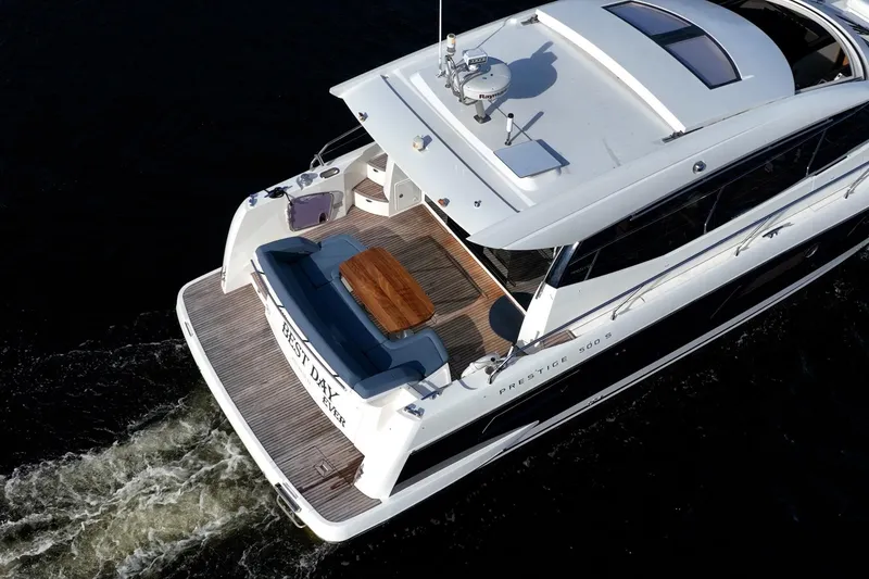 Slide: The Image of Aerial view of 2013 Prestige 500S yacht cruising on dark water. - 70