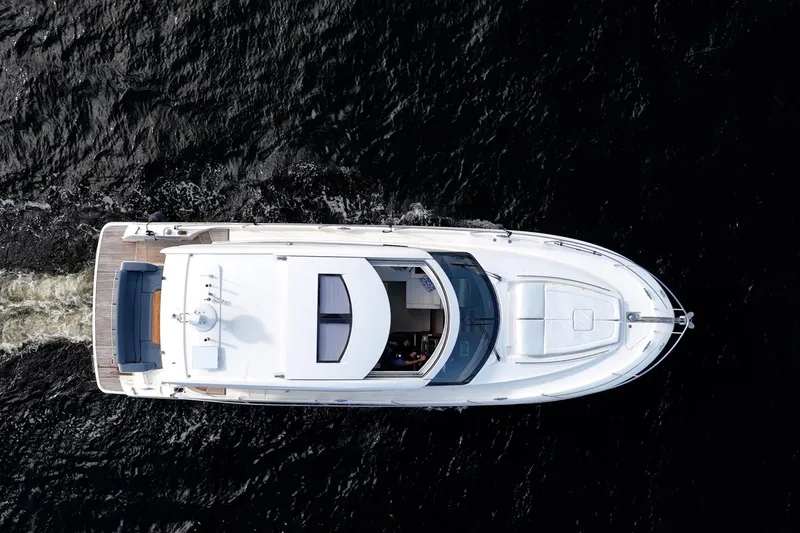 Slide: The Image of Aerial view of 2013 Prestige 500S yacht cruising on dark water. - 80