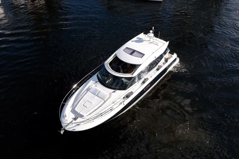 Slide: The Image of 2013 Prestige 500S yacht cruising on dark water, aerial view. - 84