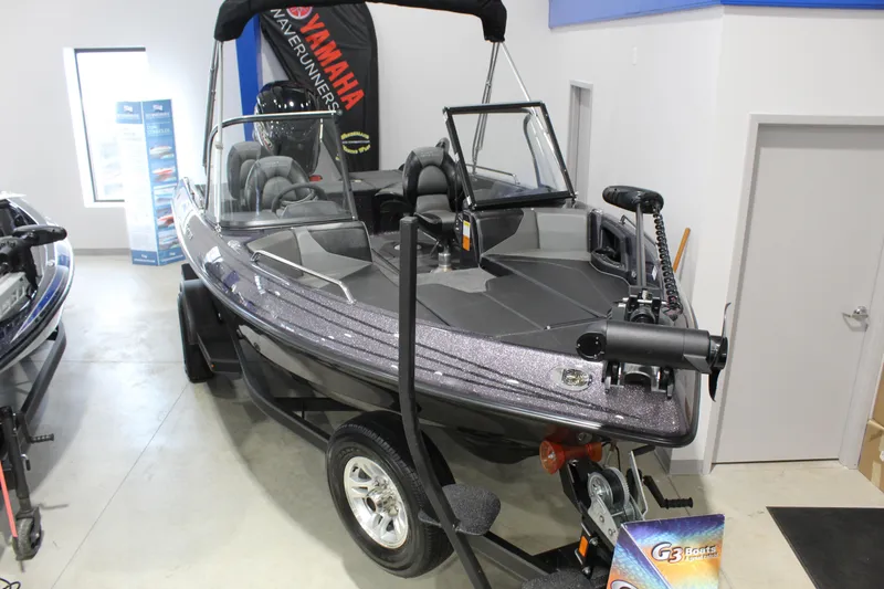 Slide: The Image of 2026 Skeeter Solera 189 boat displayed indoors on a trailer. - 1