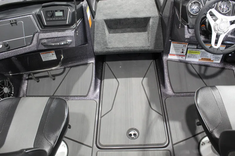 Slide: The Image of 2026 Skeeter Solera 189 boat interior with steering wheel and seating. - 10