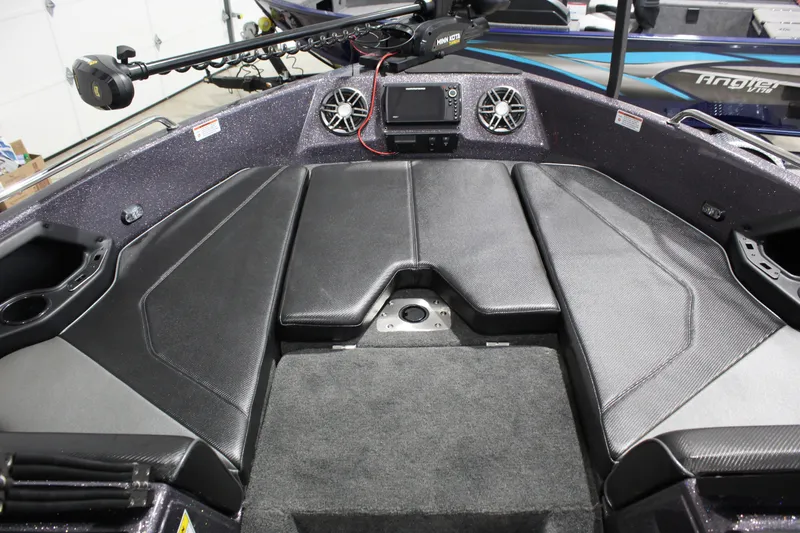 Slide: The Image of 2026 Skeeter Solera 189 boat interior with black seating and electronic controls. - 11