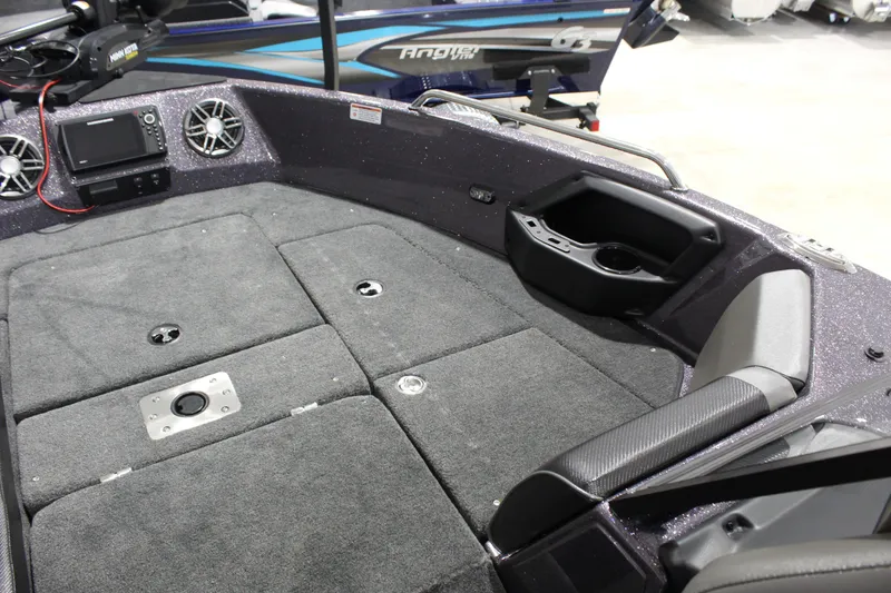 Slide: The Image of 2026 Skeeter Solera 189 boat interior with carpeted deck and built-in speakers. - 12