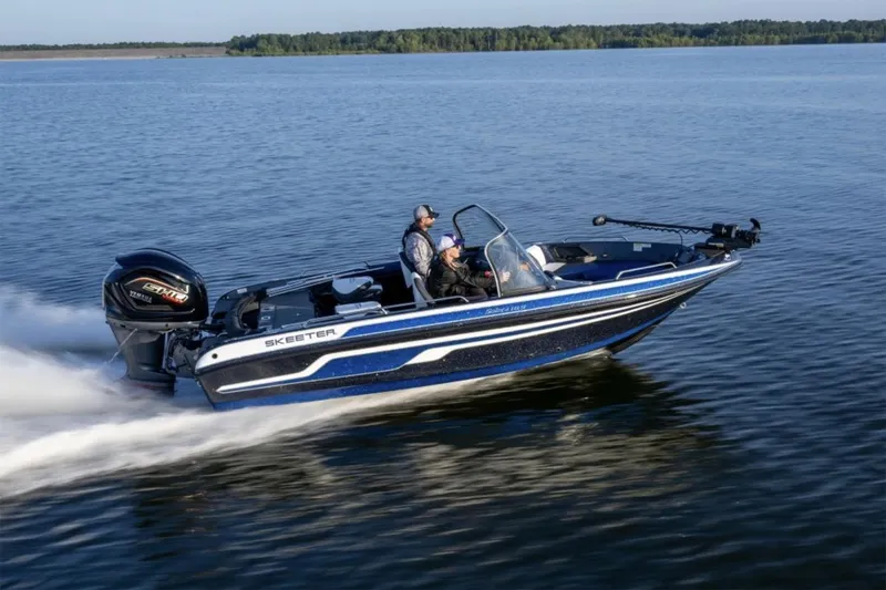 Slide: The Image of Manufacturer Provided Image: 2026 Skeeter Solera 189 boat cruising on a calm lake. - 14