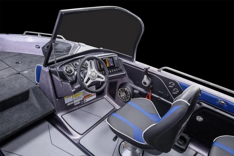 Slide: The Image of Manufacturer Provided Image: 2026 Skeeter Solera 189 boat interior with steering wheel and seating. - 18