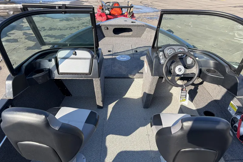 Slide: The Image of 2026 Crestliner 1850 Kodiak WT interior with dual seats and steering console. - 15