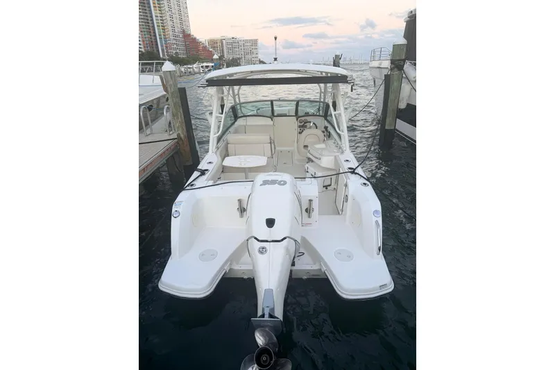 Slide: The Image of Boston Whaler 230 Vantage 2016 docked at sunset. - 9
