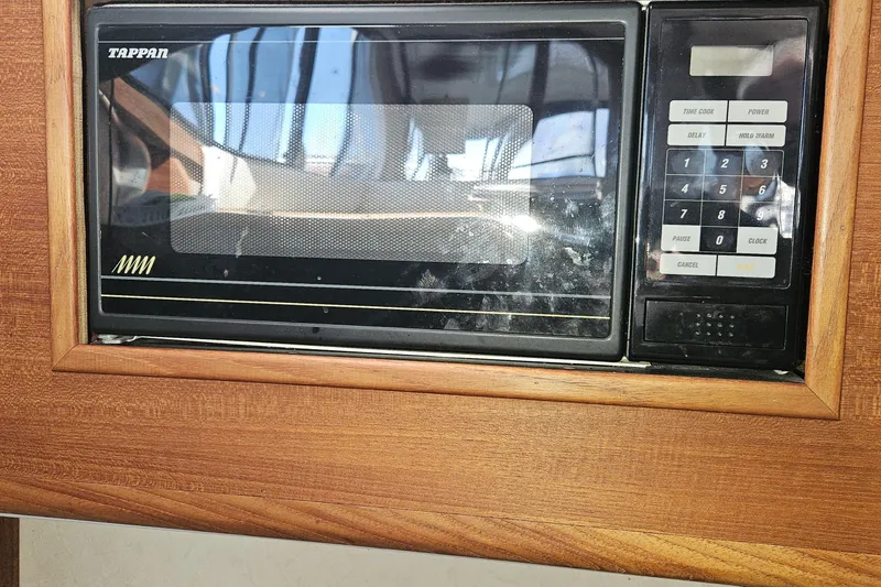 Slide: The Image of Built-in Tappan microwave in 1994 Bayliner 3288 Motoryacht kitchen area. - 18