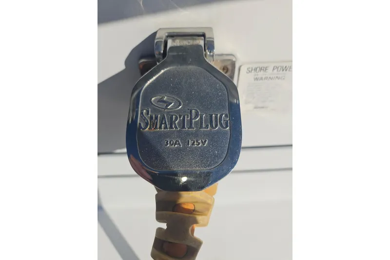 Slide: The Image of SmartPlug 30A 125V connector on 1994 Bayliner 3288 Motoryacht. - 32