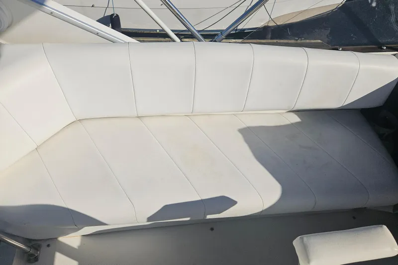 Slide: The Image of White seating area on a 1994 Bayliner 3288 Motoryacht. - 8