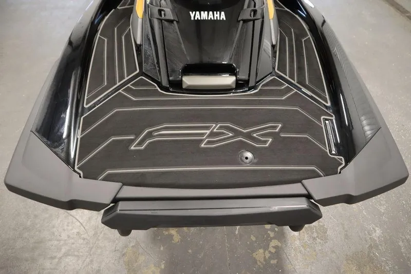 Slide: The Image of 2025 Yamaha WaveRunner FX Cruiser HO rear deck with sleek black design. - 19