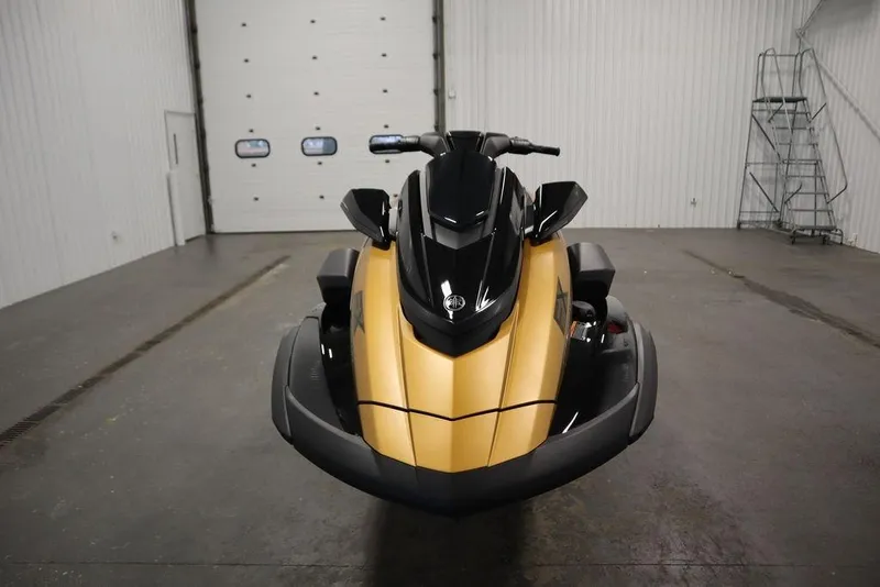 Slide: The Image of 2025 Yamaha WaveRunner FX Cruiser HO in a garage, front view. - 2