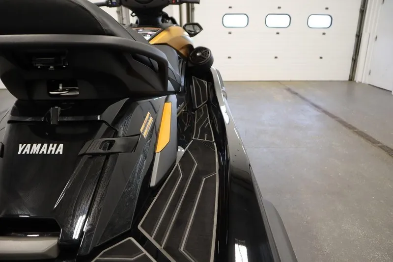 Slide: The Image of 2025 Yamaha WaveRunner FX Cruiser HO in a garage, showcasing sleek design and branding. - 21