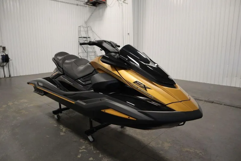 Slide: The Image of 2025 Yamaha WaveRunner FX Cruiser HO in a showroom, featuring sleek black and gold design. - 3
