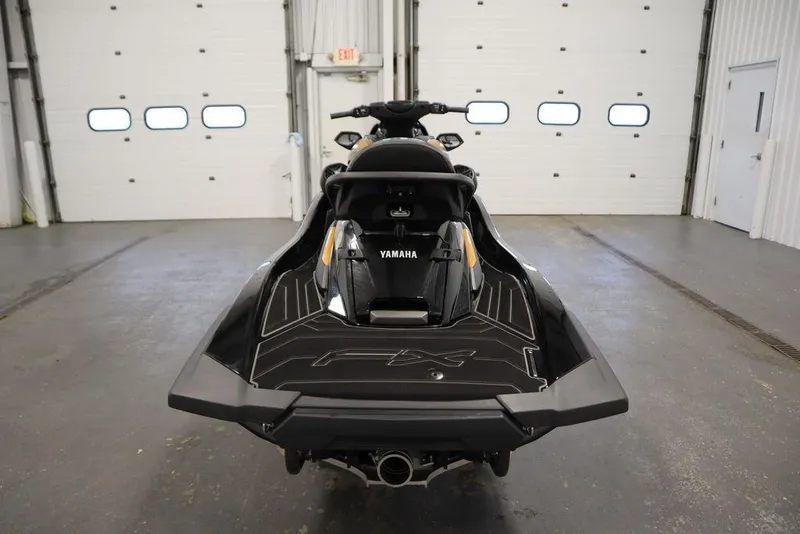 Slide: The Image of 2025 Yamaha WaveRunner FX Cruiser HO in a garage, rear view. - 4
