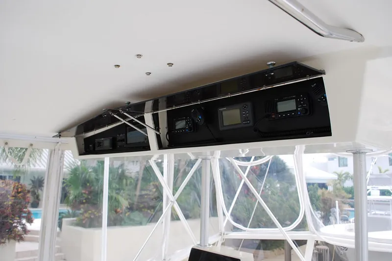 Slide: The Image of 1988 Viking 45 Convertible yacht cockpit with advanced navigation equipment and controls. - 7