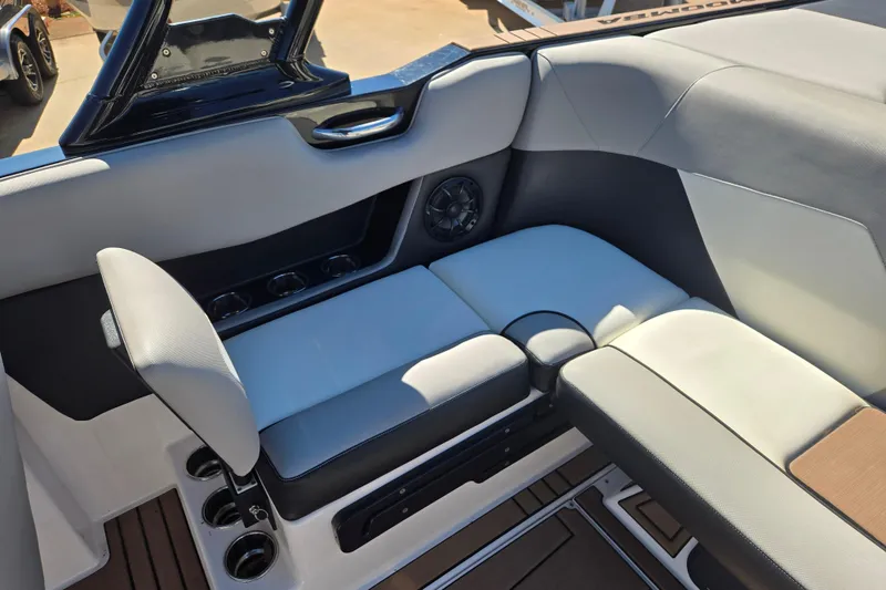 Slide: The Image of 2020 Moomba Helix boat interior with comfortable seating and cup holders. - 16