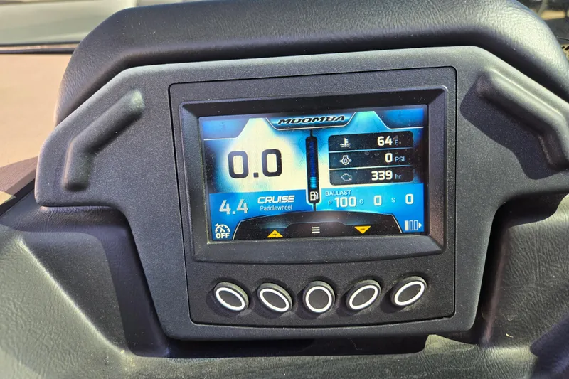 Slide: The Image of 2020 Moomba Helix dashboard display showing speed, temperature, and cruise settings. - 24