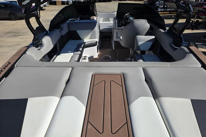 Slide: The Image of 2020 Moomba Helix boat interior with modern seating and steering console. - 37