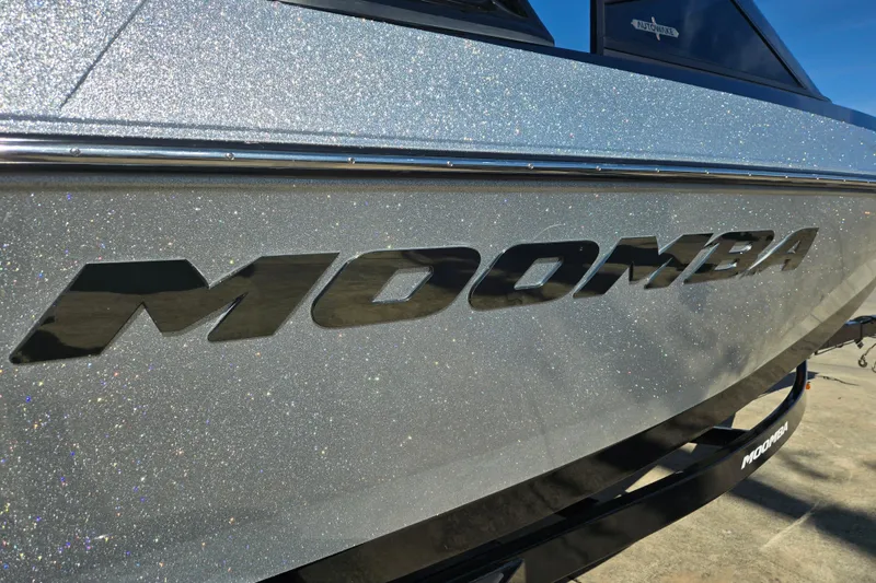 Slide: The Image of 2020 Moomba Helix boat with sparkling silver finish and bold logo. - 7