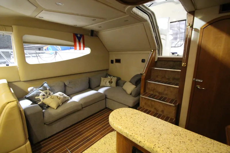 Slide: The Image of Luxurious interior of 2003 Cruisers Yachts 4450 Express Motoryacht with cozy seating and elegant design. - 40