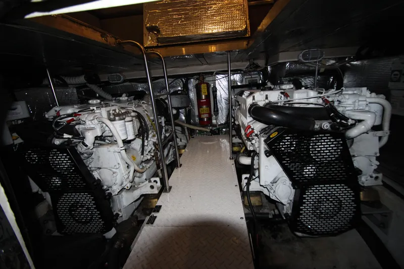 Slide: The Image of Engine room of 2003 Cruisers Yachts 4450 Express Motoryacht with dual engines. - 74